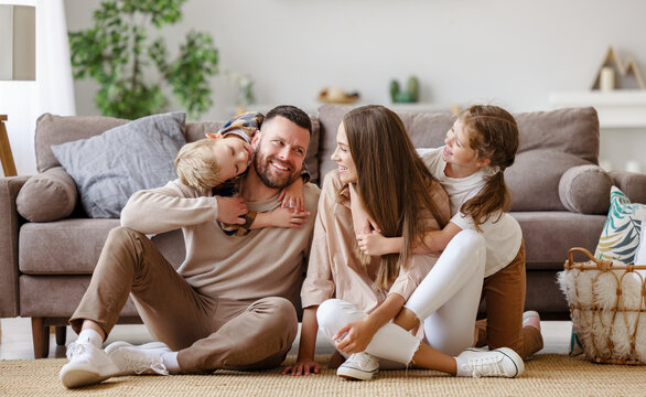 Relieved family at home after an emergency HVAC repair by American Heating & Air Plus